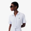 Ausgestelltes Mini-Poloshirt-Kleid für Damen Ausgestelltes Mini-Poloshirt-Kleid für Damen