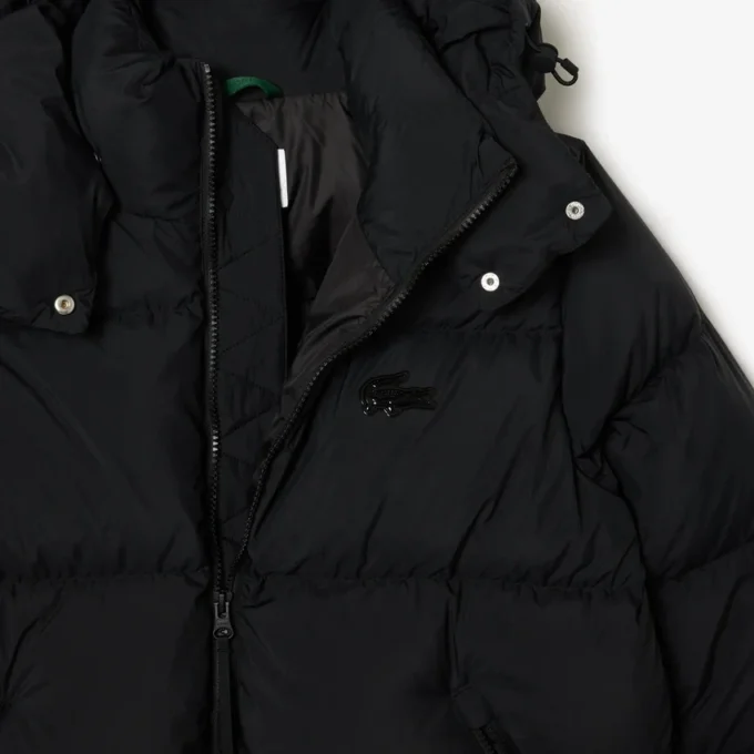 Damen-Daunenjacke mit Kapuze in Relaxed Fit Damen-Daunenjacke mit Kapuze in Relaxed Fit