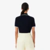 Damen-Golfpullover mit Polokragen und kurzen Ärmeln Damen-Golfpullover mit Polokragen und kurzen Ärmeln