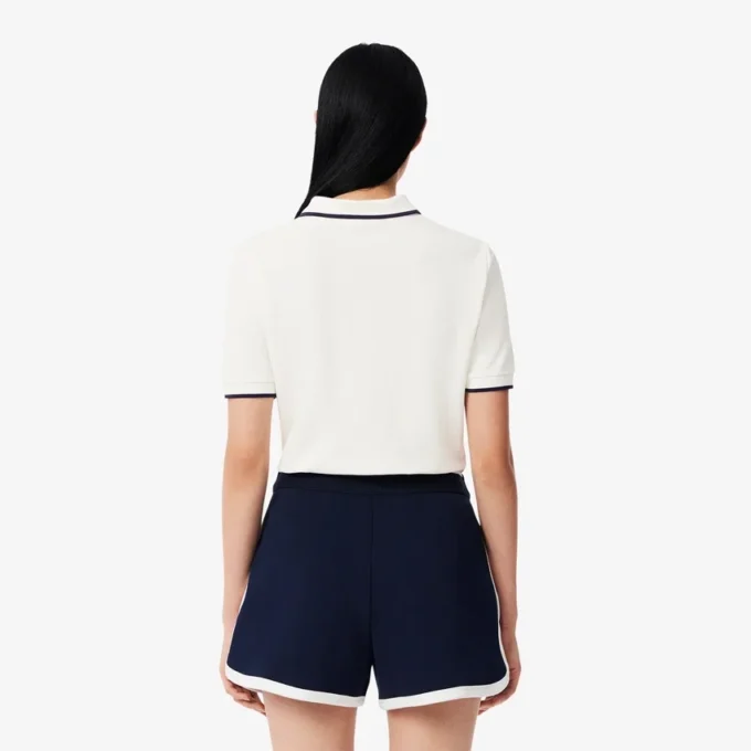 Damen-Polohemd in Regular Fit mit Thermoregulierung für Tennis Damen-Polohemd in Regular Fit mit Thermoregulierung für Tennis