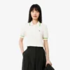 Damen-Poloshirt aus nahtloser 3D-Stretch-Baumwolle in verkürzter Passform Damen-Poloshirt aus nahtloser 3D-Stretch-Baumwolle in verkürzter Passform
