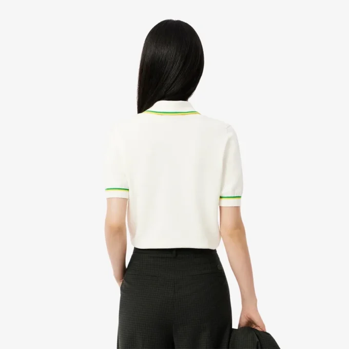 Damen-Poloshirt aus nahtloser 3D-Stretch-Baumwolle in verkürzter Passform Damen-Poloshirt aus nahtloser 3D-Stretch-Baumwolle in verkürzter Passform