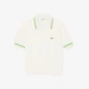 Damen-Poloshirt aus nahtloser 3D-Stretch-Baumwolle in verkürzter Passform Damen-Poloshirt aus nahtloser 3D-Stretch-Baumwolle in verkürzter Passform