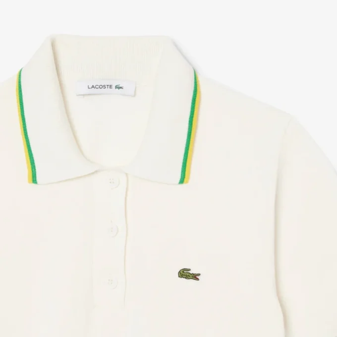 Damen-Poloshirt aus nahtloser 3D-Stretch-Baumwolle in verkürzter Passform Damen-Poloshirt aus nahtloser 3D-Stretch-Baumwolle in verkürzter Passform