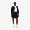 Damen-Poloshirt L.12.D Slim Fit aus gerippter Baumwolle Damen-Poloshirt L.12.D Slim Fit aus gerippter Baumwolle