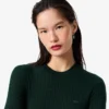 Damen-Pullover aus Merinowolle mit geripptem Strick und kurzen Ärmeln Damen-Pullover aus Merinowolle mit geripptem Strick und kurzen Ärmeln
