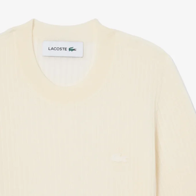 Damen-Pullover aus Merinowolle mit geripptem Strick und kurzen Ärmeln Damen-Pullover aus Merinowolle mit geripptem Strick und kurzen Ärmeln