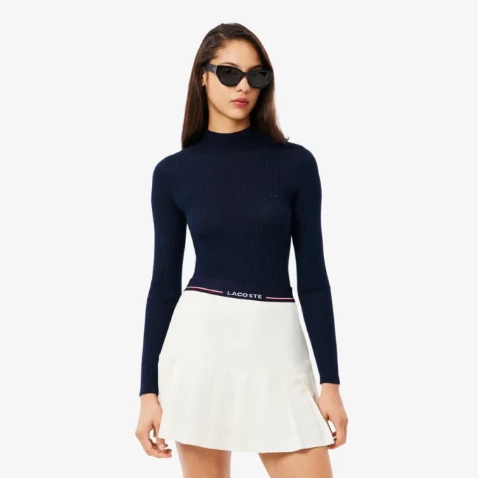 Damen-Pullover aus Merinowolle mit hohem Kragen und Rippstrick Damen-Pullover aus Merinowolle mit hohem Kragen und Rippstrick