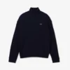 Damen-Pullover aus Wolle mit hohem Kragen und lockerer Passform Damen-Pullover aus Wolle mit hohem Kragen und lockerer Passform