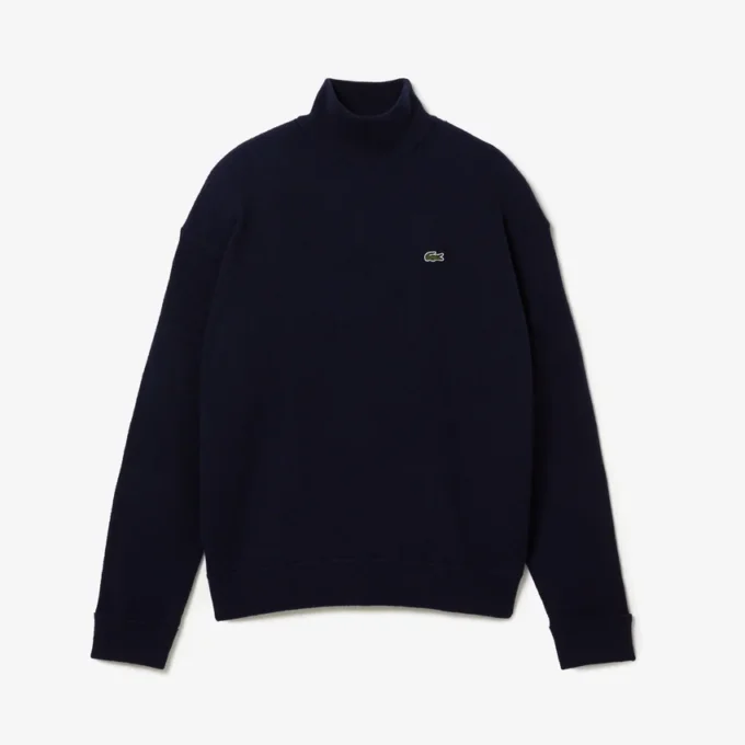 Damen-Pullover aus Wolle mit hohem Kragen und lockerer Passform Damen-Pullover aus Wolle mit hohem Kragen und lockerer Passform