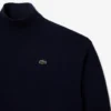 Damen-Pullover aus Wolle mit hohem Kragen und lockerer Passform Damen-Pullover aus Wolle mit hohem Kragen und lockerer Passform