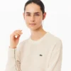 Damen-Pullover aus Wolle mit Moosmaschenmuster in Relaxed Fit Damen-Pullover aus Wolle mit Moosmaschenmuster in Relaxed Fit