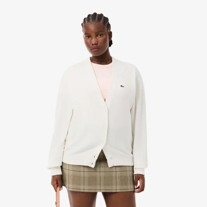 Damen-Strickjacke aus Baumwolle mit V-Ausschnitt und Moosmaschenmuster Damen-Strickjacke aus Baumwolle mit V-Ausschnitt und Moosmaschenmuster