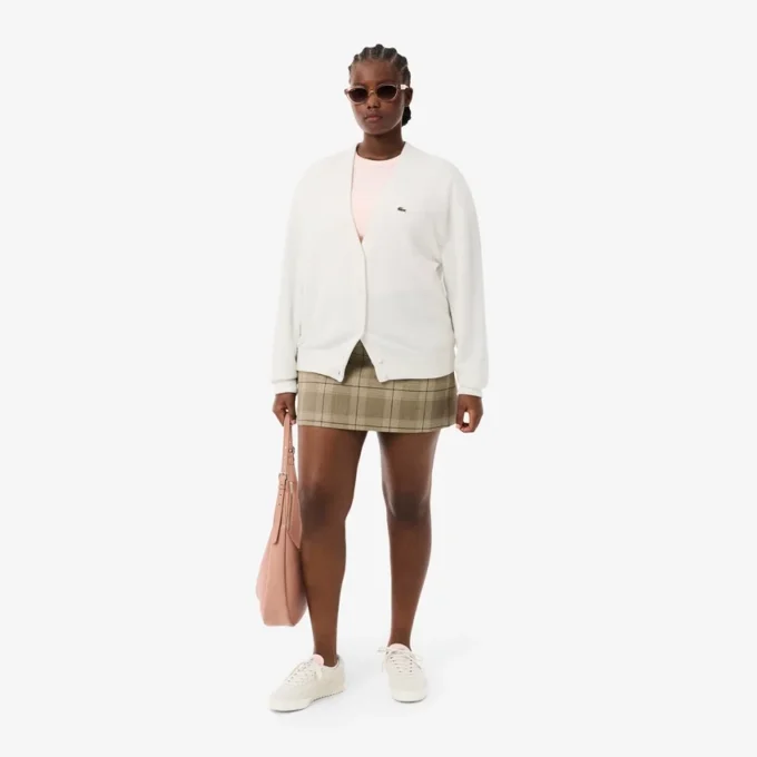 Damen-Strickjacke aus Baumwolle mit V-Ausschnitt und Moosmaschenmuster Damen-Strickjacke aus Baumwolle mit V-Ausschnitt und Moosmaschenmuster