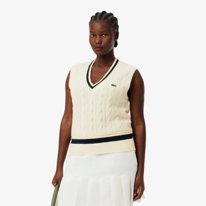 Damen-Strickweste aus Wolle mit Zopfmuster Damen-Strickweste aus Wolle mit Zopfmuster