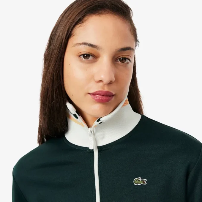 Damen-Sweatshirt mit Reißverschluss und Streifenakzenten Damen-Sweatshirt mit Reißverschluss und Streifenakzenten