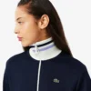 Damen-Sweatshirt mit Reißverschluss und Streifenakzenten Damen-Sweatshirt mit Reißverschluss und Streifenakzenten