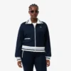 Damen-Sweatshirt mit Reißverschluss und Streifenakzenten Damen-Sweatshirt mit Reißverschluss und Streifenakzenten