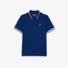 Damen-Tennis-Poloshirt mit UV-Schutz und gestreiftem Kragen Damen-Tennis-Poloshirt mit UV-Schutz und gestreiftem Kragen