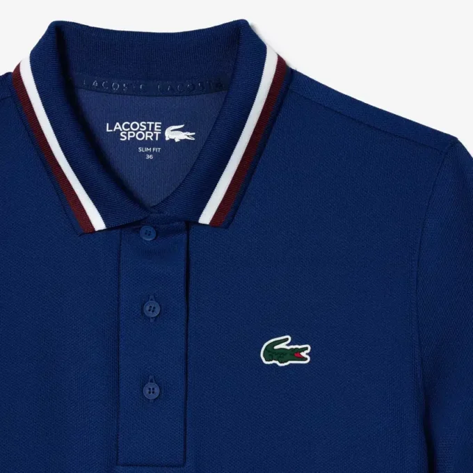 Damen-Tennis-Poloshirt mit UV-Schutz und gestreiftem Kragen Damen-Tennis-Poloshirt mit UV-Schutz und gestreiftem Kragen