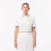 Damen-Tennis-Poloshirt mit UV-Schutz und gestreiftem Kragen Damen-Tennis-Poloshirt mit UV-Schutz und gestreiftem Kragen
