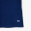 Damen-Tennis-Poloshirt mit UV-Schutz und gestreiftem Kragen Damen-Tennis-Poloshirt mit UV-Schutz und gestreiftem Kragen