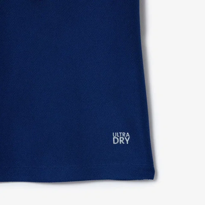 Damen-Tennis-Poloshirt mit UV-Schutz und gestreiftem Kragen Damen-Tennis-Poloshirt mit UV-Schutz und gestreiftem Kragen