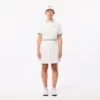 Damen-Tennis-Poloshirt mit UV-Schutz und gestreiftem Kragen Damen-Tennis-Poloshirt mit UV-Schutz und gestreiftem Kragen