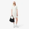 Damenkleid mit Plissee und Poloshirt-Kragen Damenkleid mit Plissee und Poloshirt-Kragen
