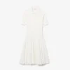 Damenkleid mit Plissee und Poloshirt-Kragen Damenkleid mit Plissee und Poloshirt-Kragen