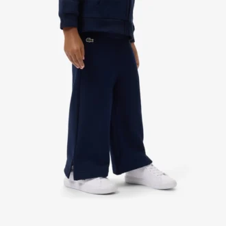 Fleece-Jogginghose für Mädchen mit ausgestelltem Bein Fleece-Jogginghose für Mädchen mit ausgestelltem Bein
