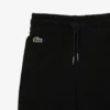 Fleece-Jogginghose für Mädchen mit ausgestelltem Bein Fleece-Jogginghose für Mädchen mit ausgestelltem Bein