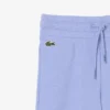 Fleece-Jogginghose für Mädchen mit ausgestelltem Bein Fleece-Jogginghose für Mädchen mit ausgestelltem Bein