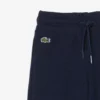 Fleece-Jogginghose für Mädchen mit ausgestelltem Bein Fleece-Jogginghose für Mädchen mit ausgestelltem Bein