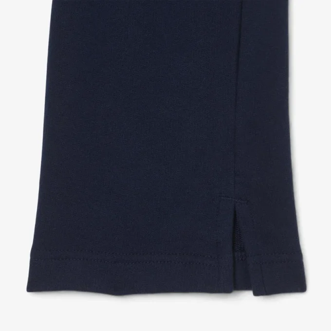 Fleece-Jogginghose für Mädchen mit ausgestelltem Bein Fleece-Jogginghose für Mädchen mit ausgestelltem Bein