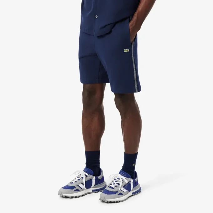 Fleece-Shorts mit Logo-Streifen in Regular Fit Fleece-Shorts mit Logo-Streifen in Regular Fit