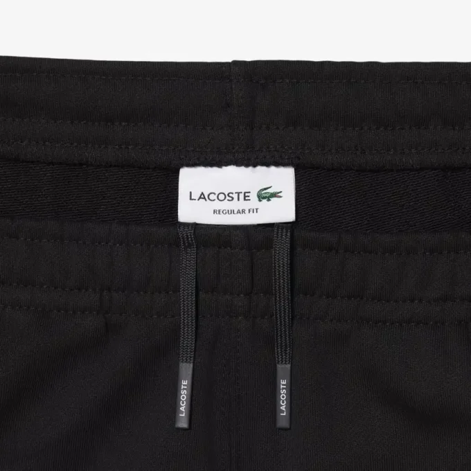 Fleece-Shorts mit Logo-Streifen in regulärer Passform Fleece-Shorts mit Logo-Streifen in regulärer Passform
