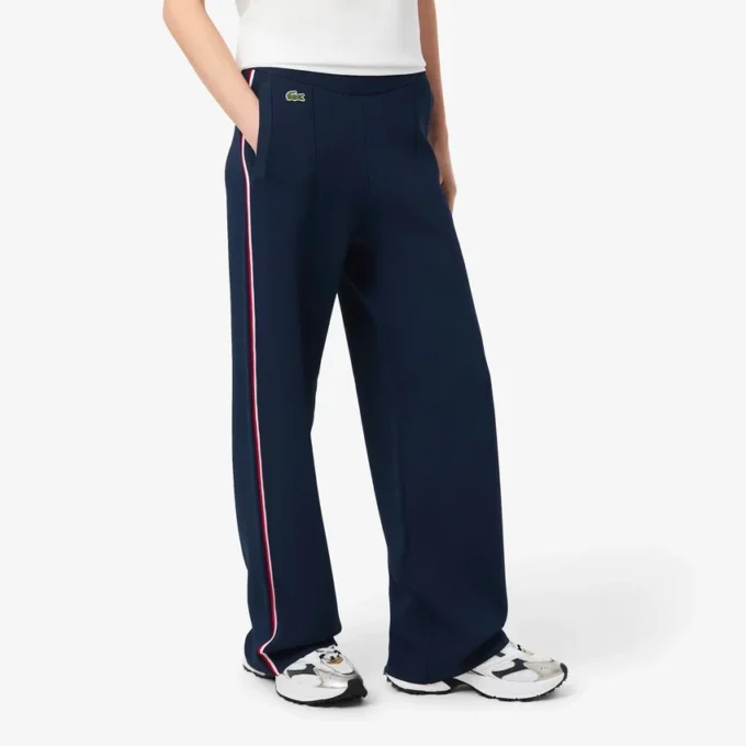 Gestreifte Damen-Jogginghose mit ausgestelltem Bein Gestreifte Damen-Jogginghose mit ausgestelltem Bein