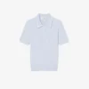 Gestreifter Pullover mit Zopfmuster und Poloshirt-Kragen Gestreifter Pullover mit Zopfmuster und Poloshirt-Kragen