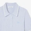 Gestreifter Pullover mit Zopfmuster und Poloshirt-Kragen Gestreifter Pullover mit Zopfmuster und Poloshirt-Kragen