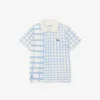 Gestreiftes Piqué-Tennis-Poloshirt für Jungen Gestreiftes Piqué-Tennis-Poloshirt für Jungen