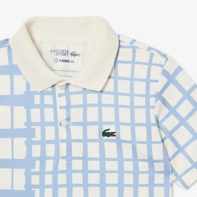 Gestreiftes Piqué-Tennis-Poloshirt für Jungen Gestreiftes Piqué-Tennis-Poloshirt für Jungen