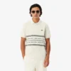 Hergestellt in Frankreich Klassisch geschnittenes gestreiftes Poloshirt Hergestellt in Frankreich Klassisch geschnittenes gestreiftes Poloshirt