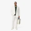 Herren-Blazer mit doppelter Knopfleiste und gesticktem Heritage-Emblem Herren-Blazer mit doppelter Knopfleiste und gesticktem Heritage-Emblem