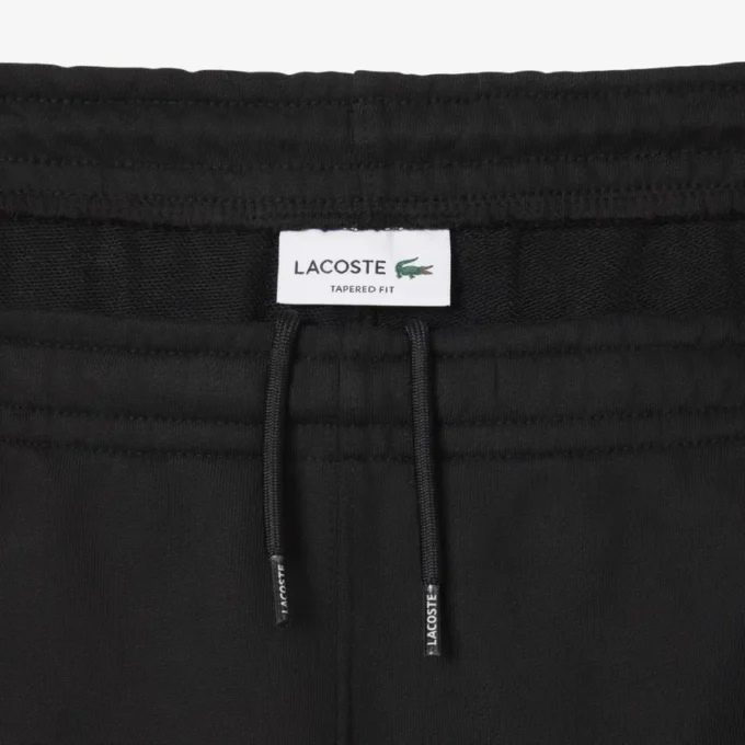 Herren-Fleece-Jogginghose mit schmal zulaufendem Bein Herren-Fleece-Jogginghose mit schmal zulaufendem Bein