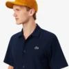 Herren-Golfhemd aus Stretch mit „Ultra Dry“-Print Herren-Golfhemd aus Stretch mit „Ultra Dry“-Print