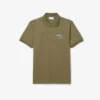 Herren-Poloshirt in klassischer Passform mit gesticktem Motiv Herren-Poloshirt in klassischer Passform mit gesticktem Motiv