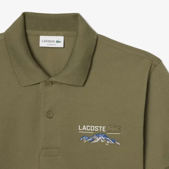 Herren-Poloshirt in klassischer Passform mit gesticktem Motiv Herren-Poloshirt in klassischer Passform mit gesticktem Motiv