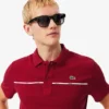 Herren-Poloshirt „L.12.12“ mit Logo-Einfassung in Regular Fit