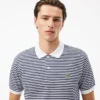 Herren-Poloshirt L.12.12 mit Streifenmuster in klassischer Passform Herren-Poloshirt L.12.12 mit Streifenmuster in klassischer Passform